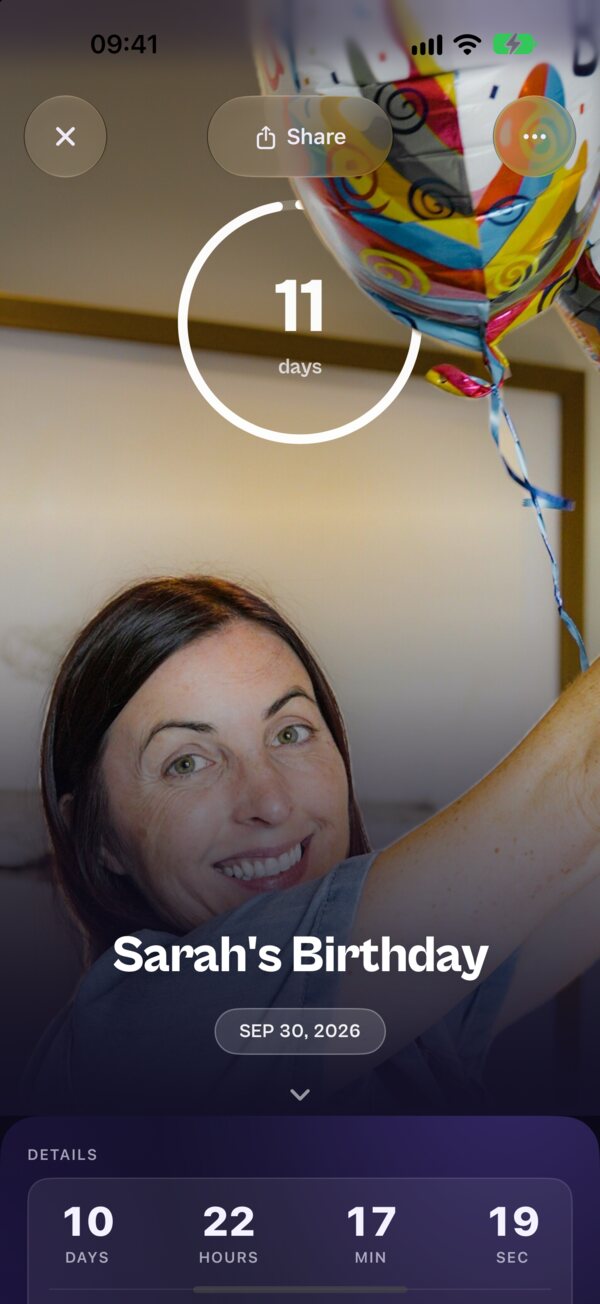 A Kounts birthday countdown over a photo, with the balloons in front of the ring